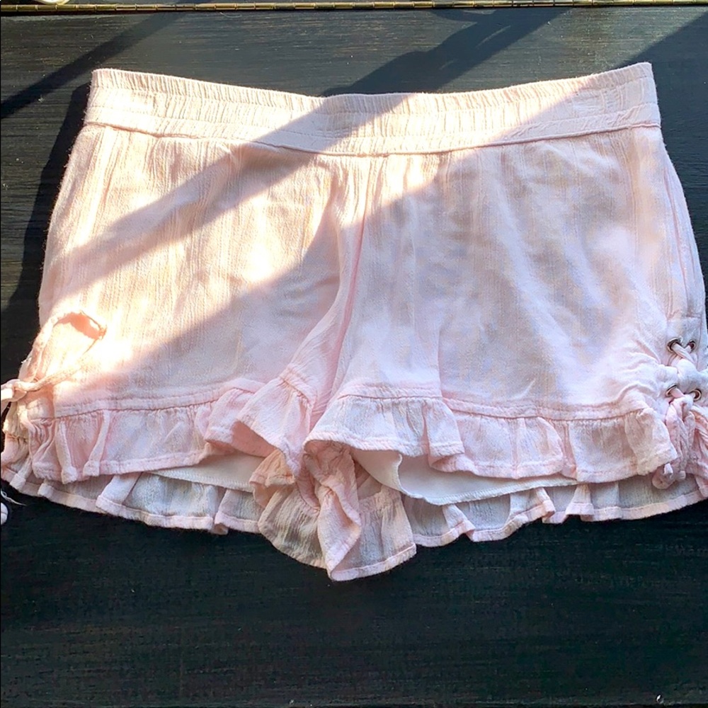 Pink float shorts with tie sides
